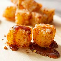 imagemDadinhos de tapioca com mel