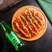 imagemCombo 1 pizza individual + 1 Tônica Wewi