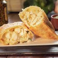 imagemPastel de Palmito c/ Azeitona, Tomate Seco, Catupiry, Queijo e Orégano