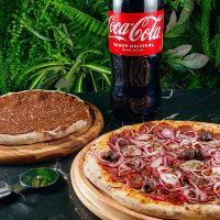 imagemPizza 35 cm + pizza 25cm ( doce ) Grátis refri 2l :)