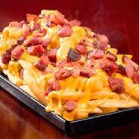 imagemPorção de batata palito com cheddar e bacon 250g