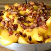 imagemPorção de batata palito com cheddar e bacon 400g